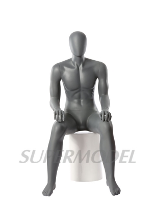 Sitting male mannequin